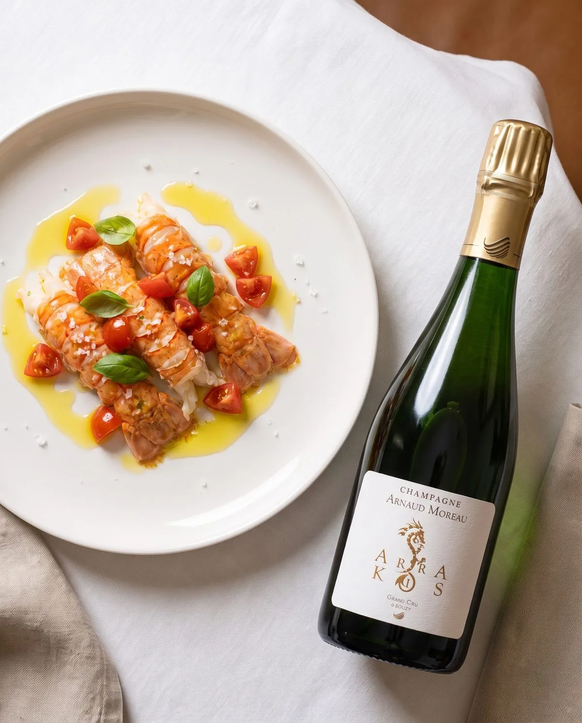 Langoustines juste snackées, huile vierge citronnée · accord champagne Arnaud Moreau